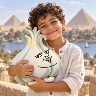 A smiling child hugging a Gabriela Garlic plush